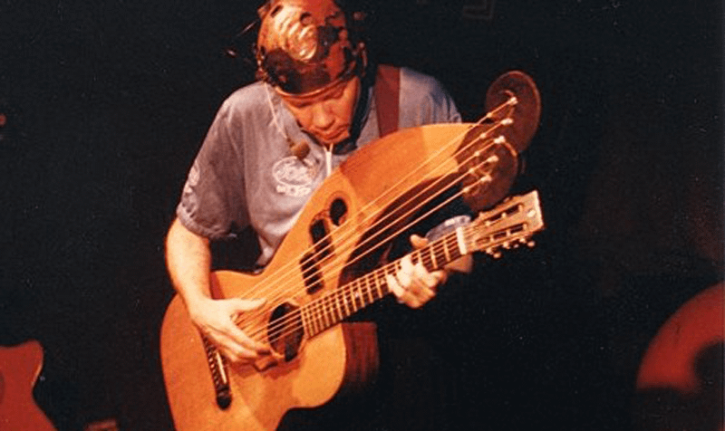 Michael with harp guitar at the Iron Horse, 1997